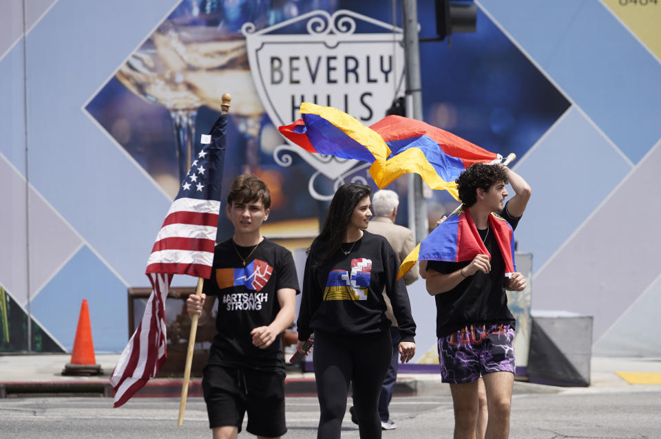 Armenian Americans youth commemorate the 108th anniversary of the Armenian Genocide Remembrance Day with a protest outside the Consulate of Turkey in Beverly Hills, Calif., Monday, April 24, 2023. (AP Photo/Damian Dovarganes)