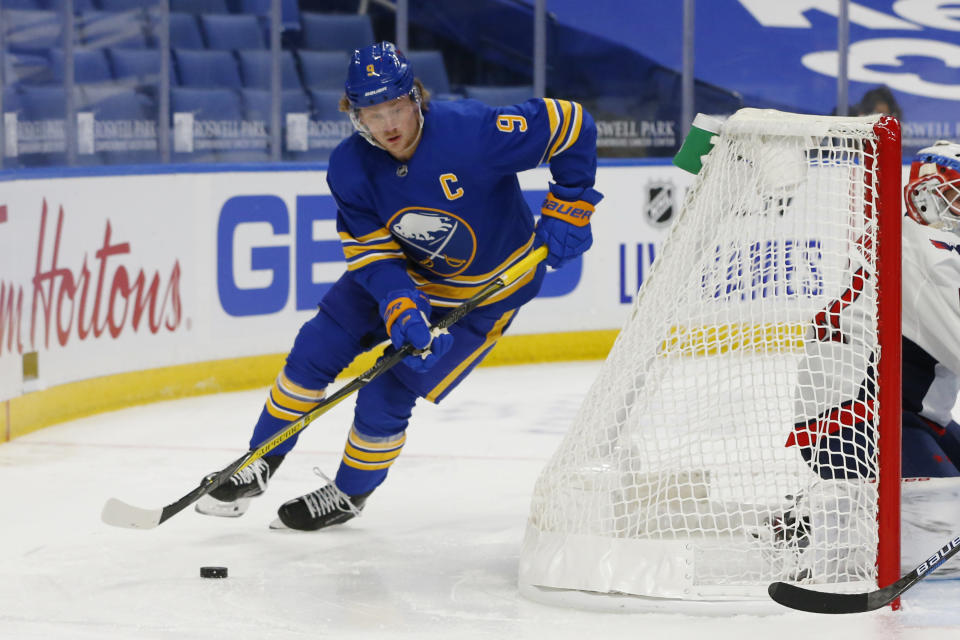 Buffalo Sabres forward Jack Eichel carries the puck during the second period of the team's NHL hockey game against the Washington Capitals, Friday, Jan. 15, 2021, in Buffalo, N.Y. (AP Photo/Jeffrey T. Barnes)