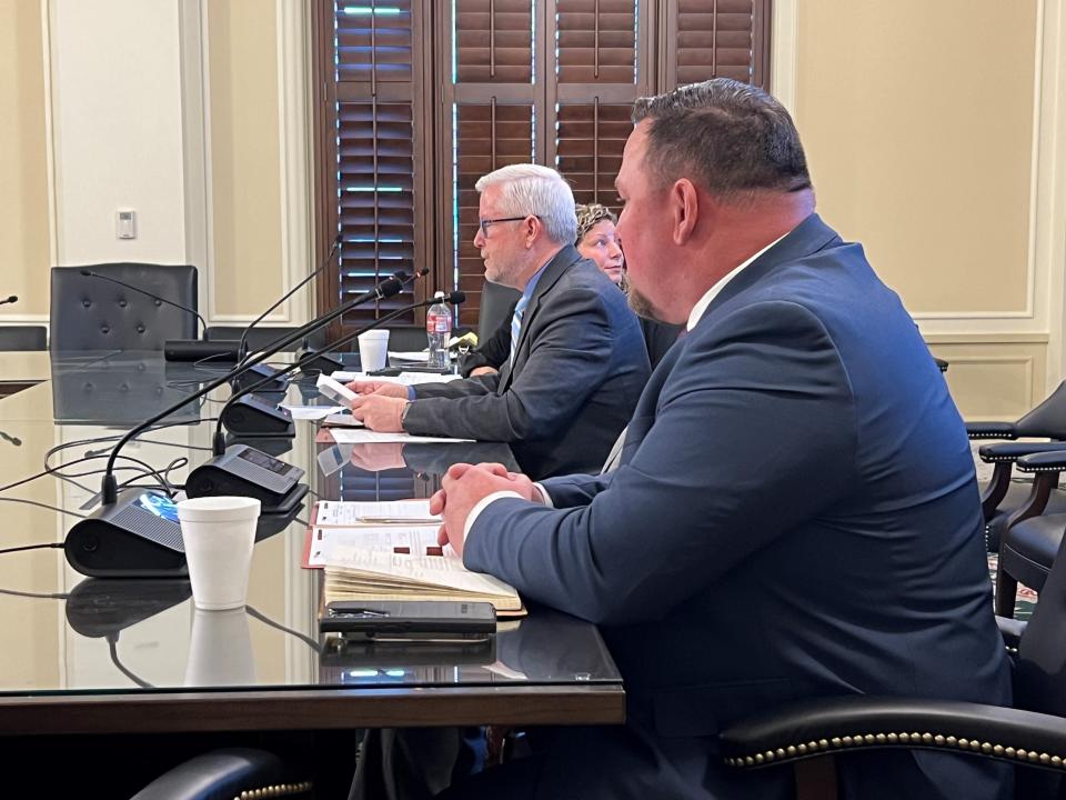 Oklahoma Department of Corrections Executive Director Steven Harpe, center, speaks during a legislative budget hearing Monday at the state Capitol. Clark told state lawmakers that the state Corrections Department would request a "flat" budget for the 2025 fiscal year and pushed back against questions about the agency's recent move of its headquarters.