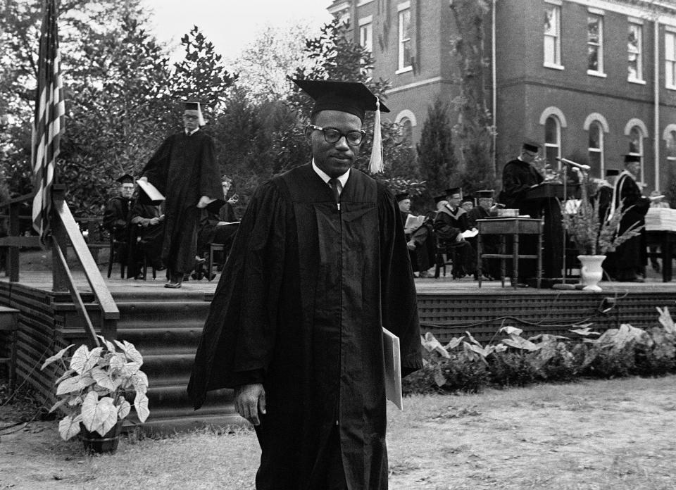 FILE - James Meredith, whose 1962 enrollment as the first Black student at the University of Mississippi sparked bloody riots, is seen after receiving his bachelor's degree during a graduation ceremony in Oxford, Miss., Aug. 18, 1963. (AP Photo/Jim Bourdier, File)