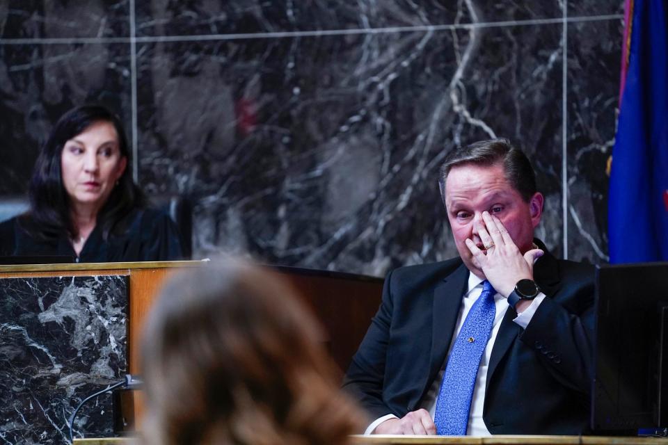 Forensic expert Edward Wagrowski becomes emotional as he testifies during James Crumbley's trial in the Oakland County courtroom of Cheryl Matthews on Thursday, March 7, 2024.