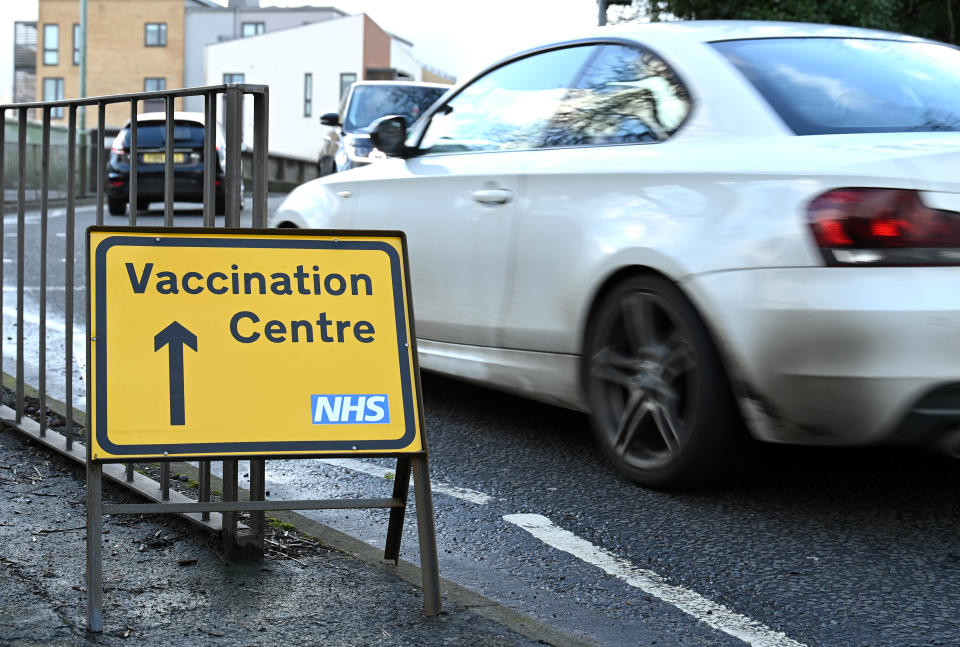 BOREHAMWOOD, ENGLAND - JANUARY 29: A road sign directing recipients of the covid vaccine to the Allum Lane vaccination centre during the third coronavirus lockdown on January 29, 2021 in Borehamwood, England. With a surge of covid-19 cases fuelled partly by a more infectious variant of the virus, British leaders have reimposed nationwide lockdown measures across England through at least mid February. (Photo by Karwai Tang/Getty Images)