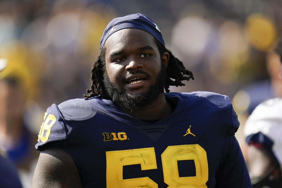 Michigan defensive lineman Mazi Smith (58) watches from the sideline against Connecticut in Ann Arbor, Mich., on Sept. 17, 2022. (AP Photo/Paul Sancya)