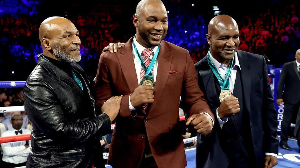 Former heavyweight champions Mike Tyson, Lennox Lewis and Evander Holyfield, pictured here in February.