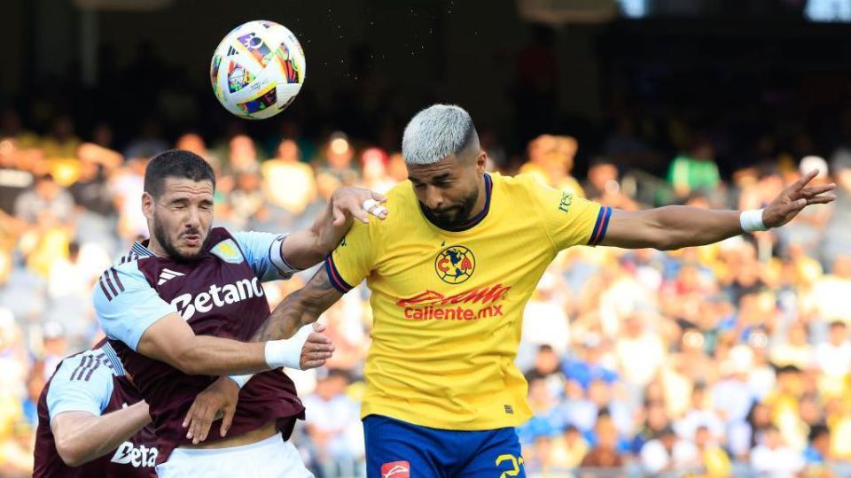 Emi Buendia of Aston Villa and Rodrigo Aguirre of Club America battle for the ball during their pre-season friendly