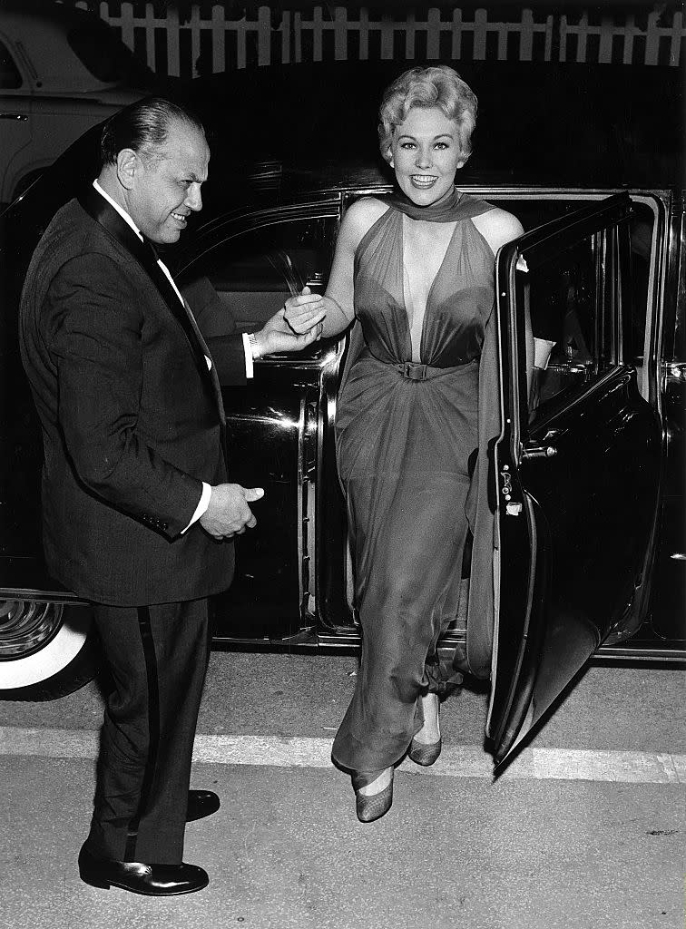 Kim Novak at Cannes Film Festival in 1956, red carpet, sheer