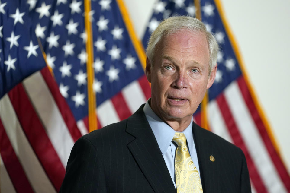 Sen. Ron Johnson, R-Wis., speaks to reporters before a Republican policy luncheon on Capitol Hill in Washington, Tuesday, Jan. 26, 2021. (AP Photo/Susan Walsh)