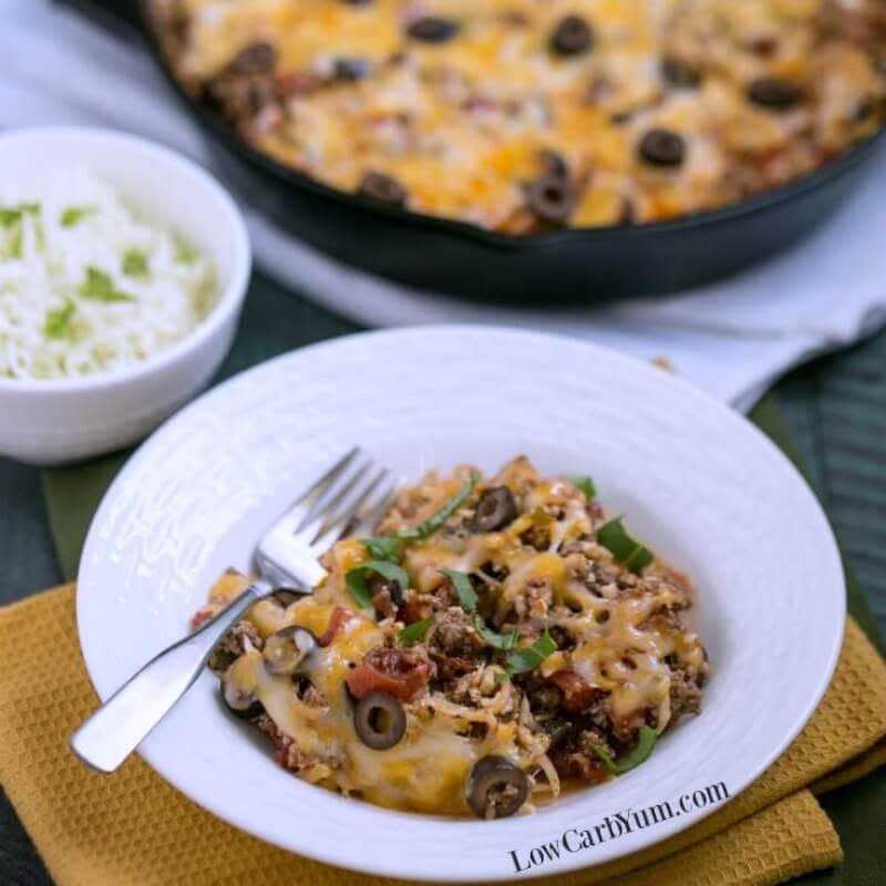 <p>Low Carb Yum</p><p>Get all the flavor of tacos in an easy-to-make skillet dish. This one-pan meal is made with cauliflower rice and ground beef. </p><p><strong>Get the recipe: <a href="https://lowcarbyum.com/cheesy-beef-taco-skillet-recipe/" rel="nofollow noopener" target="_blank" data-ylk="slk:Cheesy Beef Taco Skillet;elm:context_link;itc:0;sec:content-canvas" class="link rapid-noclick-resp">Cheesy Beef Taco Skillet</a></strong></p>