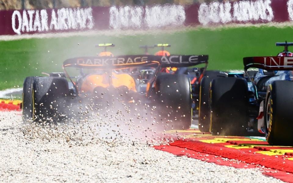 A rear view of the start as Lando Norris of Great Britain driving the (4) McLaren MCL38 Mercedes runs wide during the F1 Grand Prix of Belgium at Circuit de Spa-Francorchamps on July 28, 2024 in Spa, Belgium