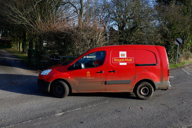 A Royal Mail van drives near the home of Britain's former chief executive of the Post Office Paula Vennells, in Bedford