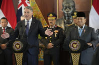 Australian Deputy Prime Minister and Defense Minister Richard Marles, left, gestures as he speaks during a joint press conference with Indonesian Defense Minister Prabowo Subianto, right, following their meeting in Jakarta, Indonesia, Friday, Feb. 23, 2024. (AP Photo/Achmad Ibrahim)