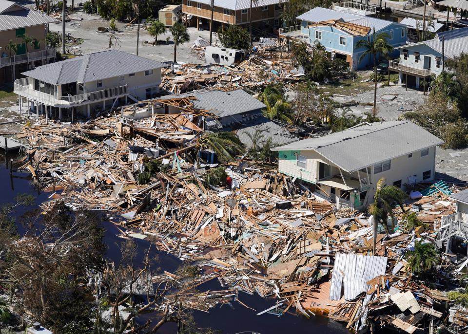 Homes and businesses are devastated after Hurricane Ian on Friday, Sept. 30, 2022, on Fort Myers Beach.