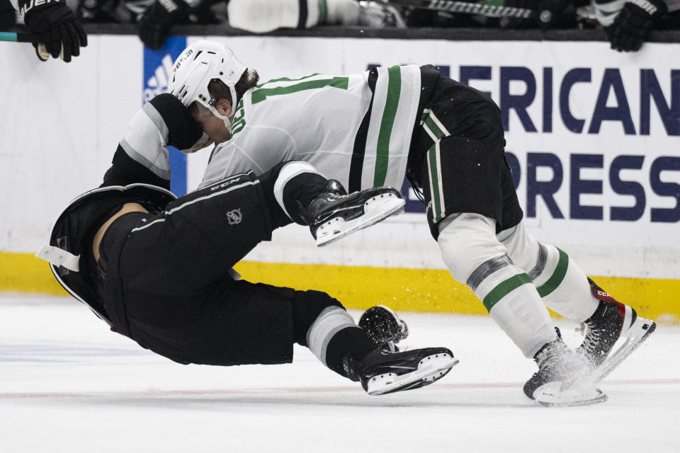 Los Angeles Kings center Blake Lizotte, left, fights Dallas Stars center Ty Dellandrea (10) during the second period of an NHL hockey game, Saturday, March 9, 2024, in Los Angeles. (AP Photo/Kyusung Gong)