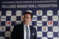 Rick Pitino the new coach of the Greek national basketball team leaves the panel after a press conference in Athens, Monday, Nov. 11, 2019. The 67-year-old American has agreed to coach the Greek national basketball team and lead its effort to qualify for the 2020 Tokyo Olympics. (AP Photo/Thanassis Stavrakis)