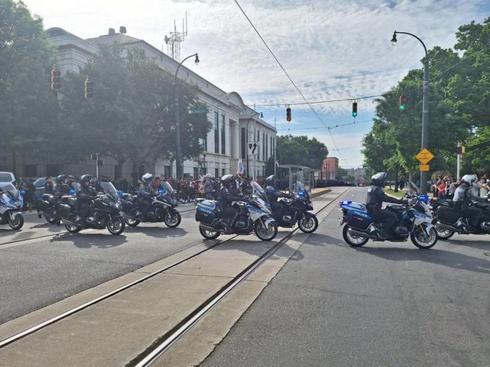 CMPD motorcycles lead the processional for CMPD officer Joshua Eyer, Friday, May 3, 2024.