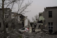 FILE - A damaged school following a Russian attack occurred at mid March, on the outskirts of Mykolaiv, Ukraine, on Friday, April 1, 2022. The International Criminal Court, prosecutors from across the globe and Ukraine’s prosecutor general are investigating more than 8,000 reports of potential war crimes in Ukraine involving 500 suspects. (AP Photo/Petros Giannakouris, File)