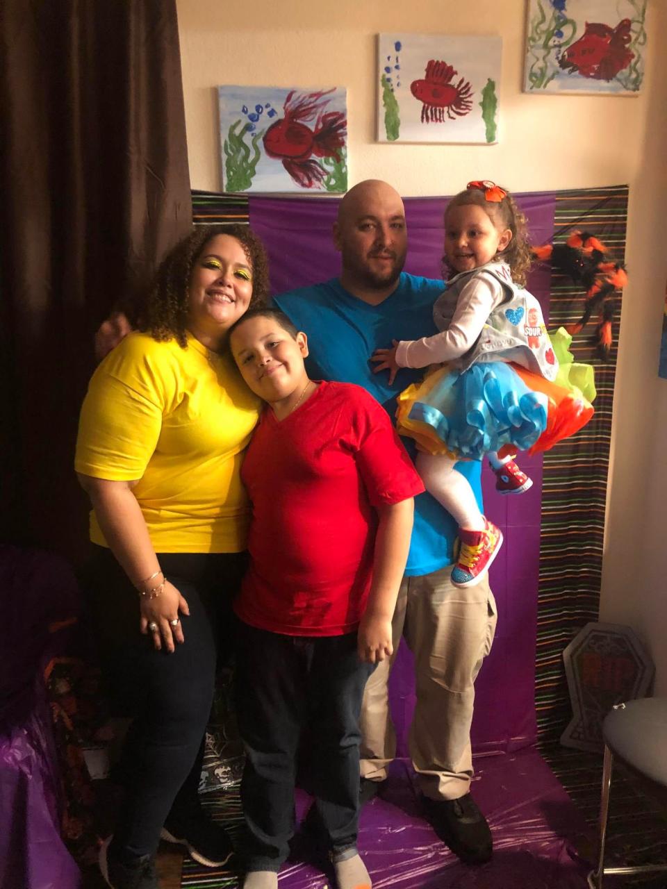 Andrew Benavente with his fiancé Digna and their children.