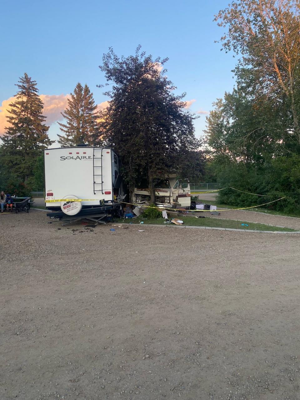 The suspect was not injured, but the collision injured people who were in the RV and others nearby, including the police officer, RCMP said.
