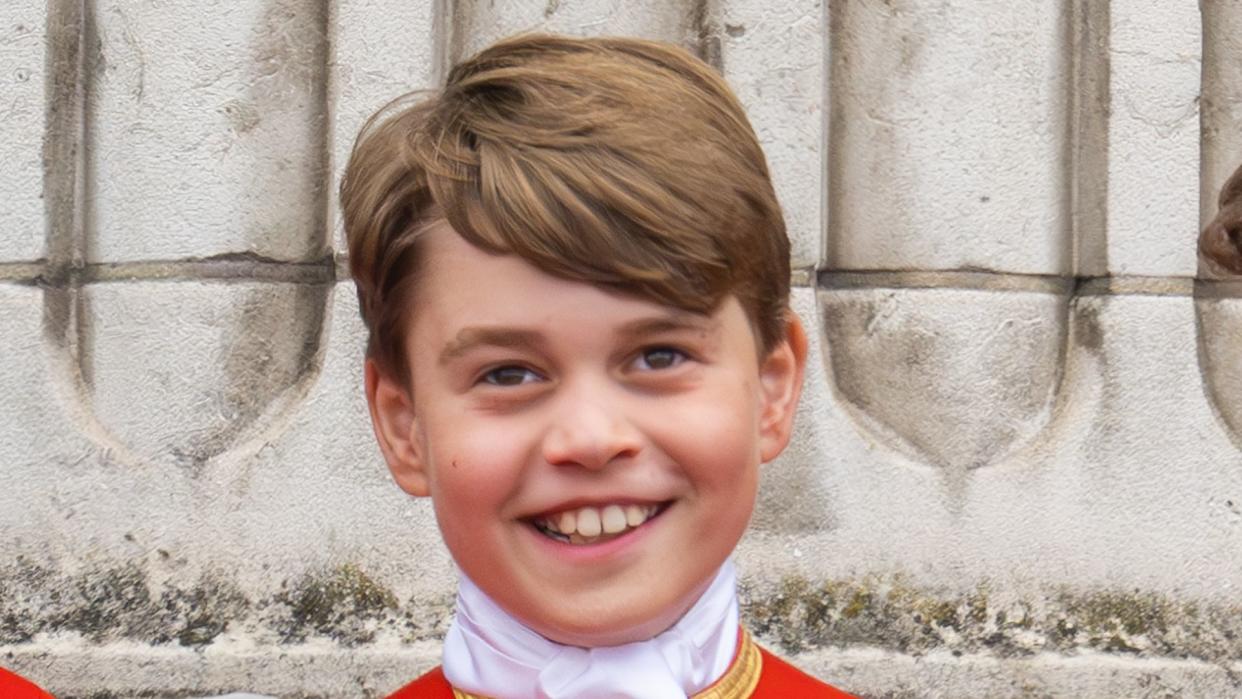 Prince George smiling on balcony after coronation