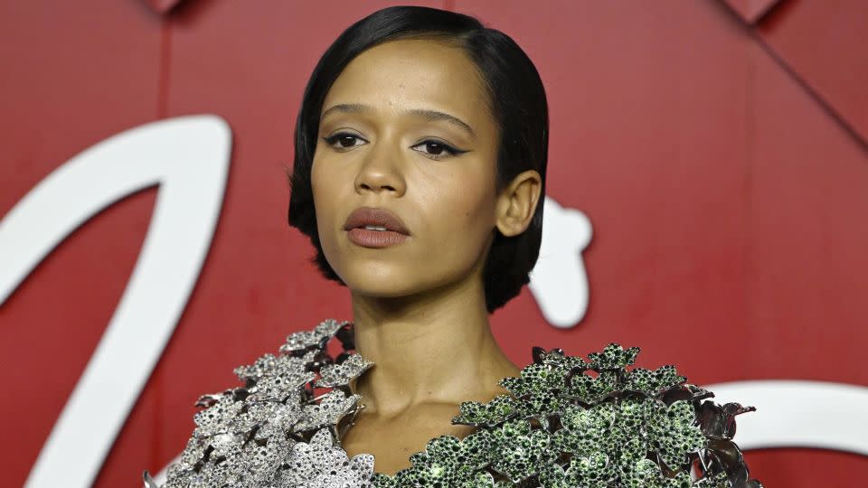 The sculptural metallic theme continued with Taylor Russell, who wore a custom Loewe look. - Gareth Cattermole/Getty Images