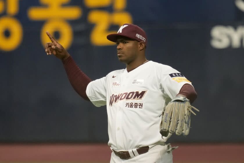 Former Major League Baseball outfielder Yasiel Puig of Kiwoom Heroes gestures in the outfield