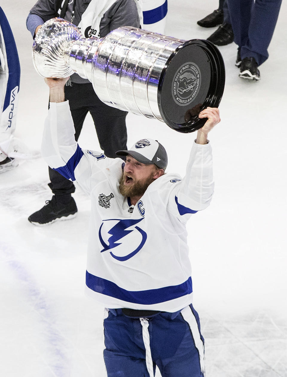 Tampa Bay Lightning center Steven Stamkos (91) hoists the Stanley Cup after defeating the Dallas Stars in Edmonton, Alberta, on Monday, Sept. 28, 2020. (Jason Franson/The Canadian Press via AP)