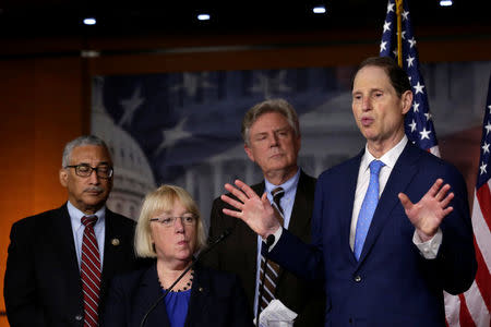 U.S. Senator Ron Wyden (D-OR) speaks at a news conference on U.S. President Trump's administration's first 100 days and healthcare, on Capitol Hill in Washington, U.S., April 26, 2017. REUTERS/Yuri Gripas