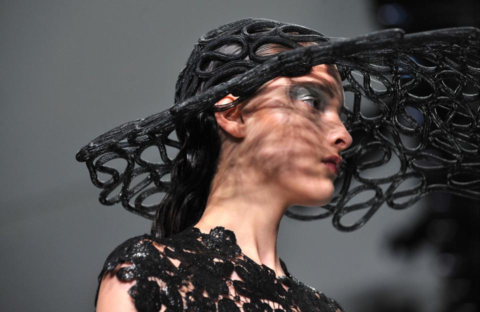 A model wears a design created by John Rocha at London Fashion Week Spring/Summer 2014 on Saturday Sept. 14, 2013 at Somerset House, London. (Photo by Richard Chambury/Invision/AP Images)