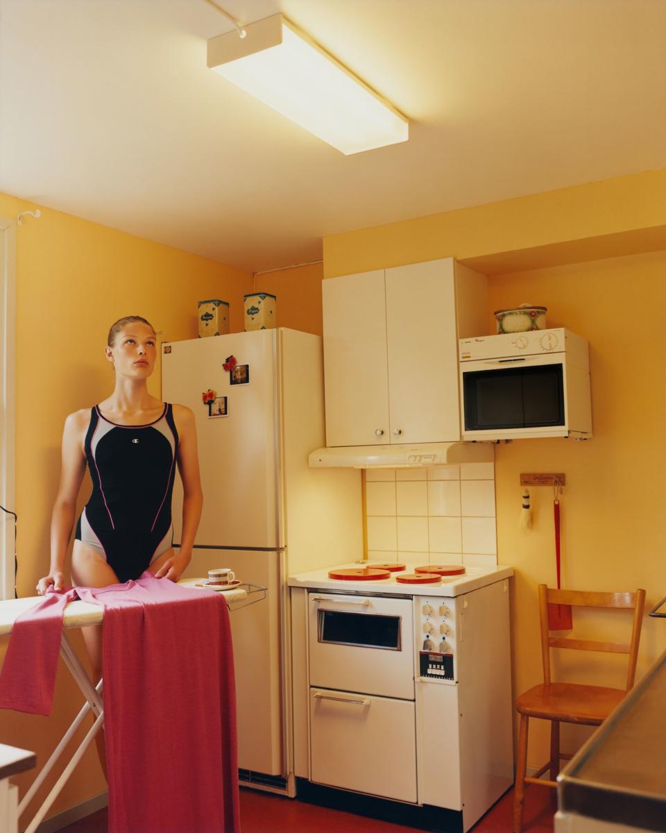 Adela ironing the Isabel Marant dress in our dream kitchen of the cabin.