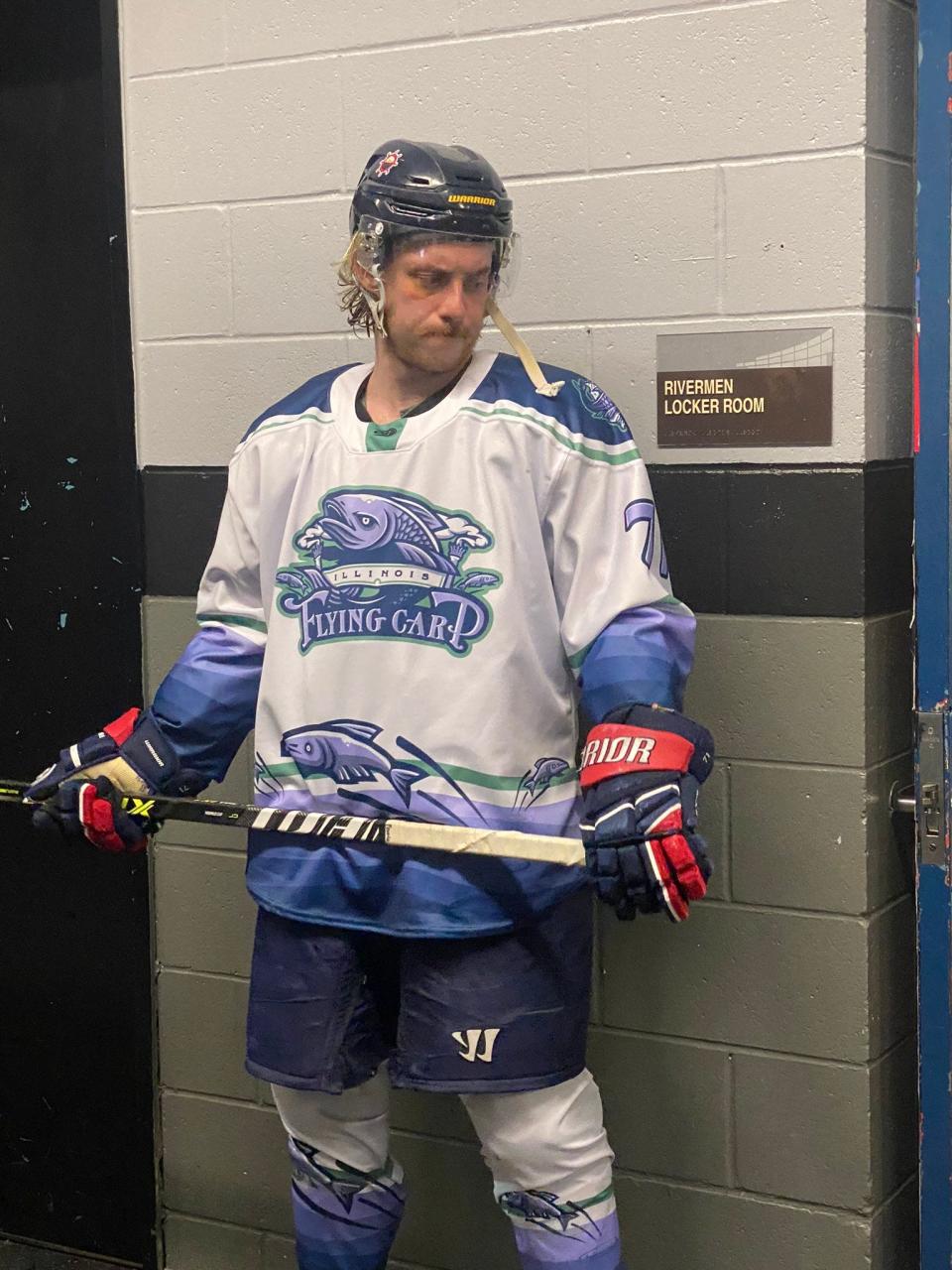 Illinois Flying Carp winger Cayden Cahill outside the locker room getting ready to take on Quad City in an SPHL game that saw the Peoria Rivermen re-brand for one night at Carver Arena on March 10, 2023. The Carp beat Quad City, 3-2.
