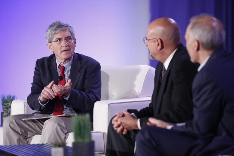 Yahoo News chief investigative correspondent Michael Isikoff, left, hosts “Beyond the firewall: How real is the cyber threat?” panel.