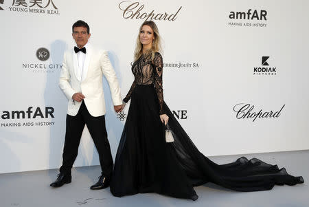 72nd Cannes Film Festival - The amfAR's Cinema Against AIDS 2019 event - Antibes, France, May 23, 2019. Antonio Banderas and his partner Nicole Kimpel arrive. REUTERS/Eric Gaillard