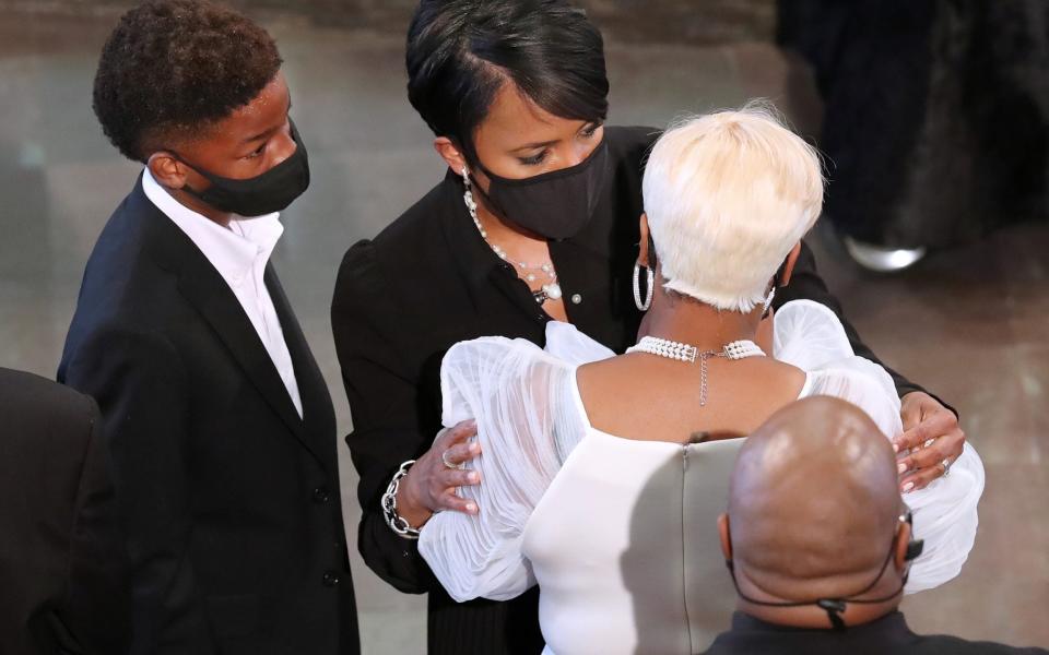 Keisha Lance Bottoms consoles Tomika Miller, widow of Rayshard Brooks who was shot dead - Reuters