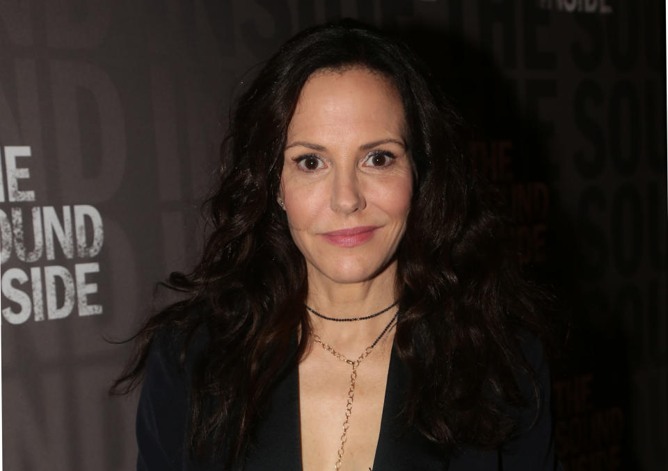 Mary-Louise Parker looks straight into the camera