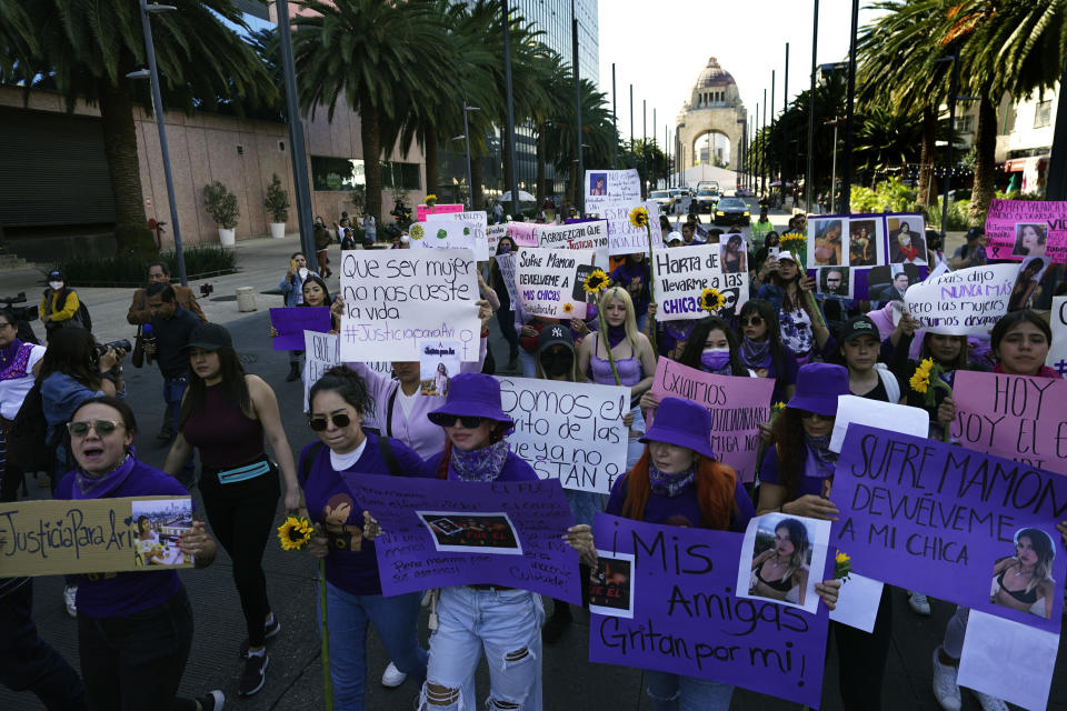 Feminist groups march to protest the murder of Ariadna Lopez, in Mexico City, Monday, Nov. 7, 2022. Prosecutors said Sunday an autopsy on Lopez who was found dead in the neighboring state of Morelos, showed she was killed by blunt force trauma. That contradicts a Morelos state forensic exam that suggested the woman choked on her own vomit as a result of intoxication. (AP Photo/Marco Ugarte)