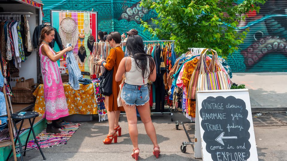 One budget-friendly option for participating in sustainable fashion is to thrift for clothes that are made with a higher percentage of natural fibers, such as cotton, hemp, linen, wool and silk, according to Dr. Preeti Arya. - Richard Levine/Alamy Stock Photo