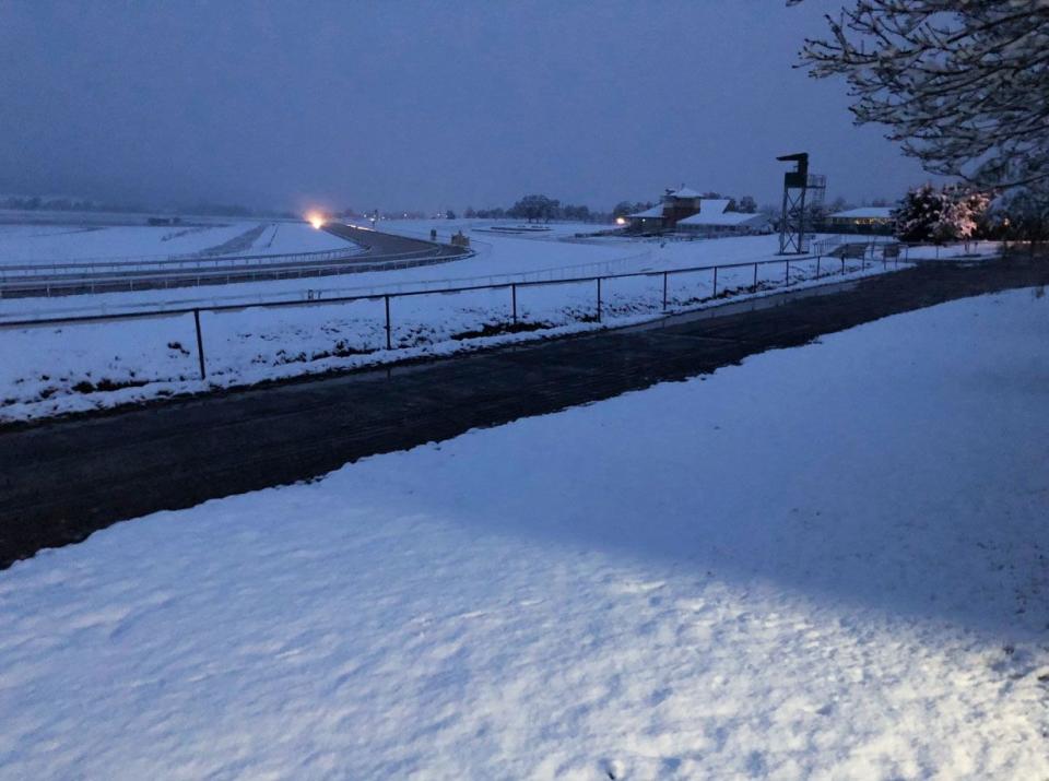 Pictured is Goulburn racecourse covered in a think blanket of snow at dawn. 