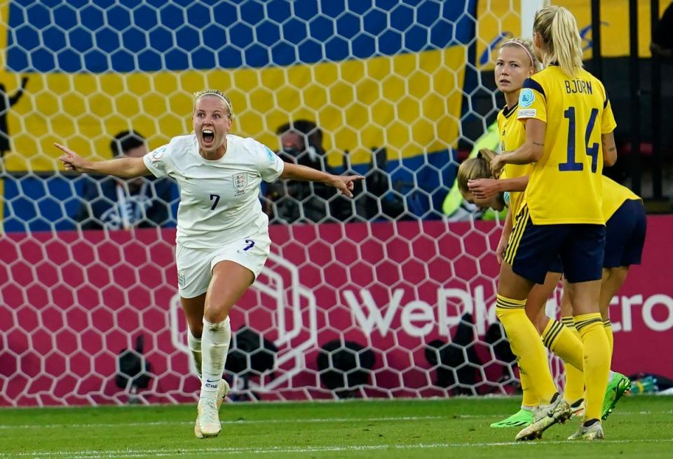 England’s Beth Mead, left, celebrates after scoring her side’s first goal (AP)