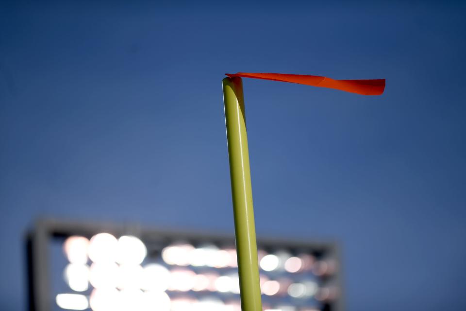 A steady wind blows during the Division V OHSAA State Football Championship at Tom Benson Hall of Fame Stadium in Canton.