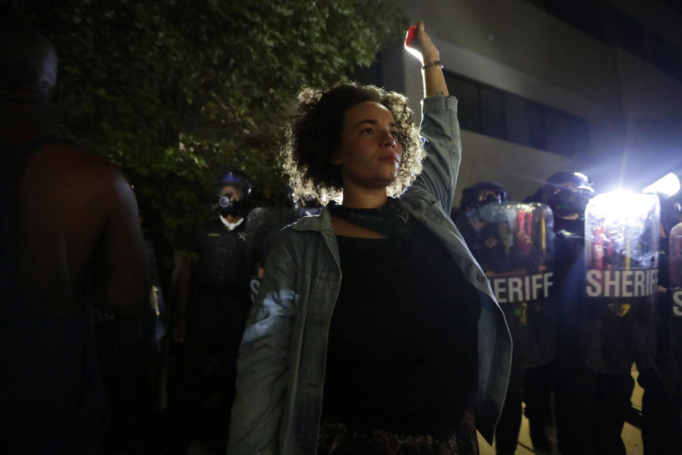 Aug 23, 2020; Kenosha, WI, USA; A woman protests outside the Kenosha Police Department in Kenosha on Sunday, Aug. 23, 2020. Mandatory Credit: Mike De Sisti/Milwaukee Journal Sentinel via USA TODAY NETWORK/Sipa USA