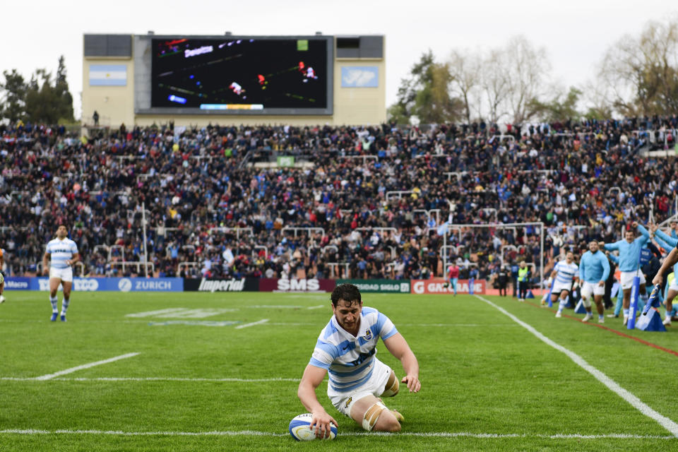 Argentina's Juan Martin Gonzalez marks a try against Australia during a rugby championship match, in Mendoza, Argentina, Saturday, Aug. 6, 2022. (AP Photo/Gustavo Garello)