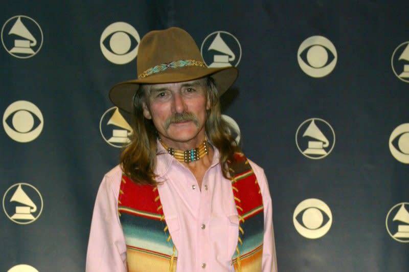 Allman Brothers Band co-founder Dickey Betts has died at 80. His family announced his passing Thursday in statement on his Instagram account. He's shown here backstage at the 47th Grammy Awards in Los Angeles on February 13, 2005. File Photo by Laura Cavanaugh/UPI