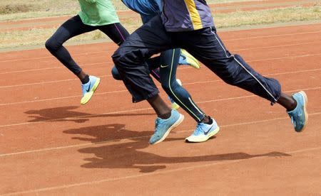 Kenya's athletes run during a training session in Nairobi, ahead of the 15th IAAF World Championships in Beijing in this August 5, 2015 file photo. REUTERS/Thomas Mukoya/Files