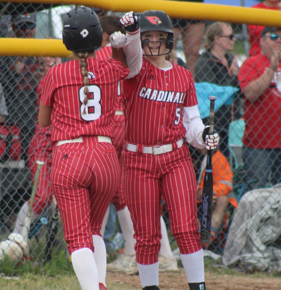Jocelyn Tobias (left) and Brittney Fox (right) celebrate during an MHSAA regional softball matchup between Johannesburg-Lewiston and Inland Lakes on Saturday, June 10 in Rudyard, Mich.