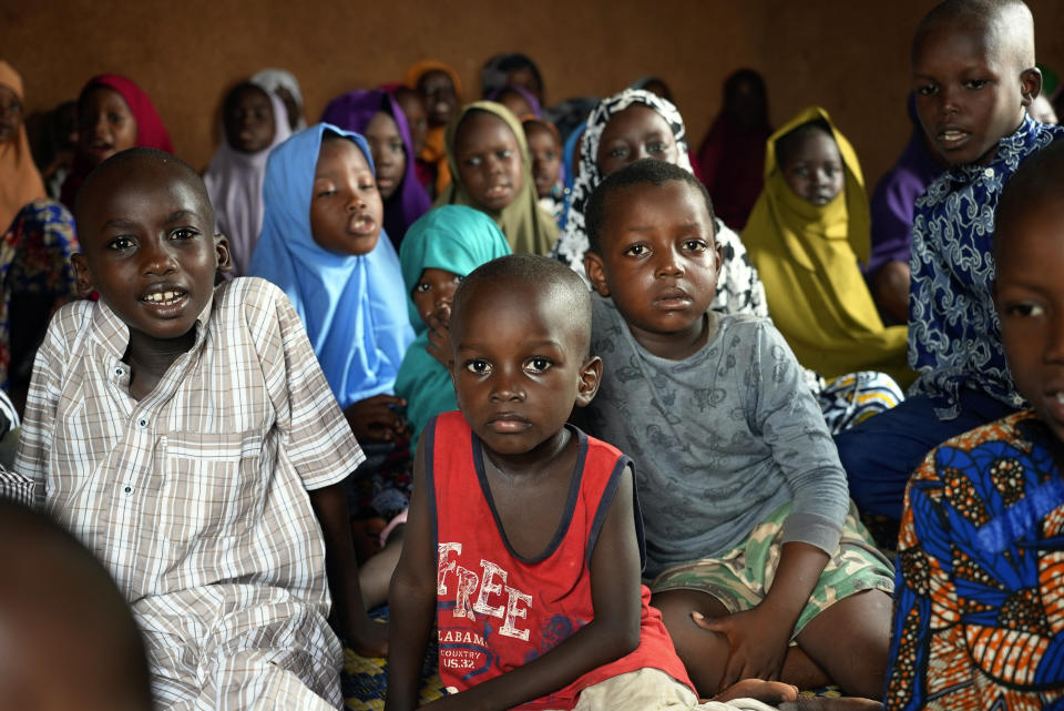 Children sing in a Koranic school in Niamey, Niger, Wednesday, Aug. 16, 2023. Nigeriens are preparing for a possible invasion by countries in the region, three weeks after mutinous soldiers ousted the nation’s democratically elected president. (AP Photo/Sam Mednick)