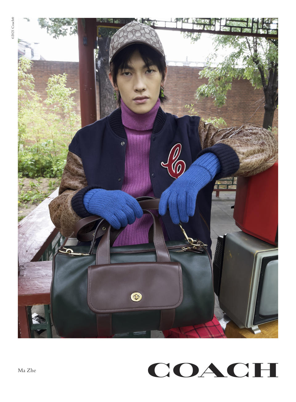 Ma Zhe stars in Coach’s campaign reintroducing its iconic Rogue bag as part of its fall collection. - Credit: © 2021 Juergen Teller