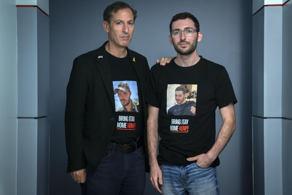 Ruby Chen, left, whose son Itay Chen, 19, was killed by Hamas on Oct. 7, 2023, and his body taken to Gaza, poses for a portrait with his son Roy Chen, after families of Americans being held hostage in Gaza by Hamas were interviewed, Wednesday, June 5, 2024, by the Associated Press in Washington. (AP Photo/Jacquelyn Martin)