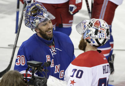 Rangers goalie Henrik Lundqvist has reason to smile, with a 0.97 GAA in six undefeated Game 7s. (AP)