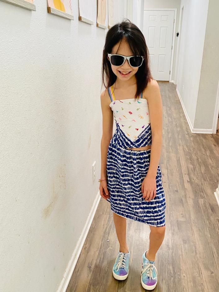 A triangle-inspired dress by 9-year-old designer Kaia Aragon.