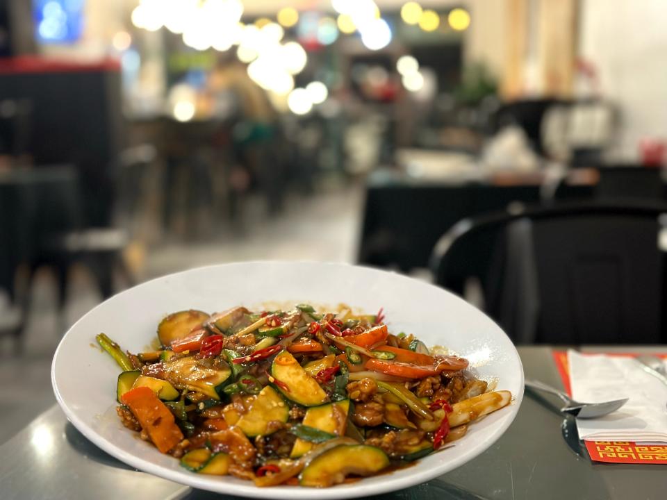 The Sweet Basil Chicken features bright fresh vegetables and slices of chicken breast in a sweet basil sauce at Taste of Thai Fusion in Salinas.